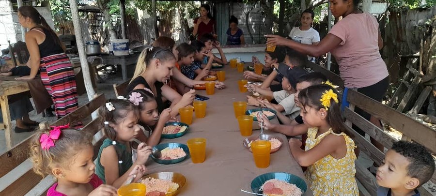 Children eating a meal together