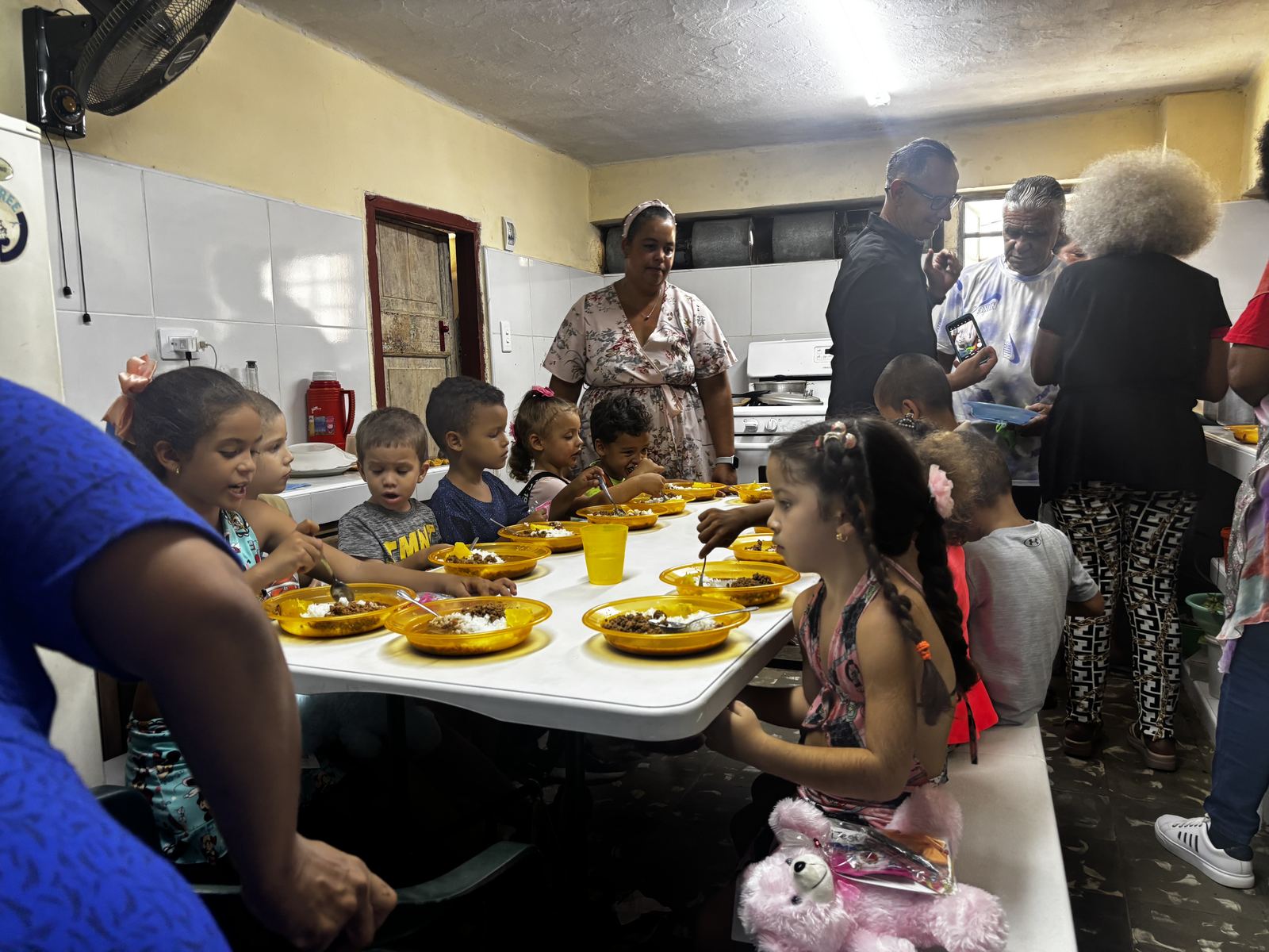 Children being fed during the August 2026 Havana, Cuba mission