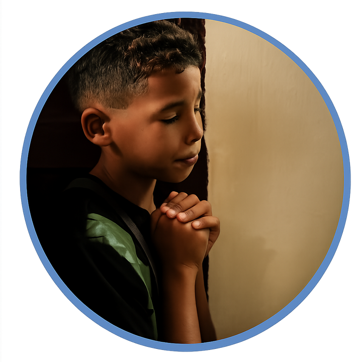 A boy praying with hands folded